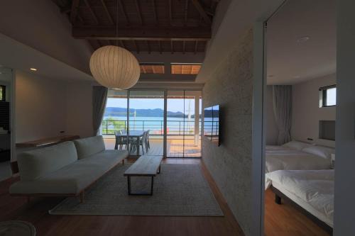 Tatsugo Apartment | Experience Amami 星空テラス with Oceanfront Dining