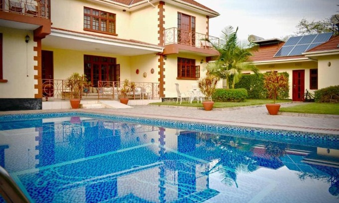 Arusha Hotel | Discover Amani Villa: Family-Friendly Stay with Pool & Dining