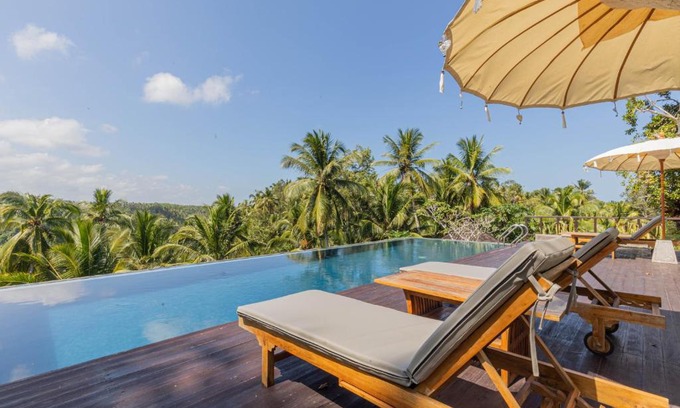 Mendoyo Cabin | Relax at Amanuba Ersadeva Resort with Oceanfront Views