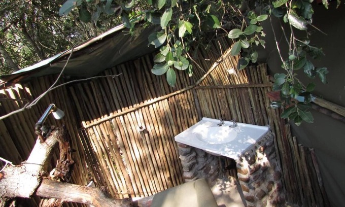 Thorny Bush Game Reserve RV Rental | Discover Amanzimlotzi Riverside Bush Tent in Limpopo