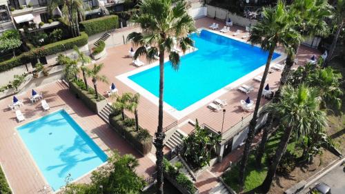 Picanello-Ognina-Barriera-Canalicchio Apartment | Discover AMARANDA HOUSE: Embrace Nature's Elements