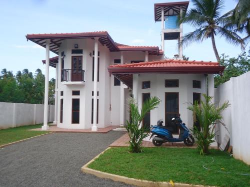 Hambantota House | Explore Amawin Resort: Guest Rated 9.4 with Family Amenities
