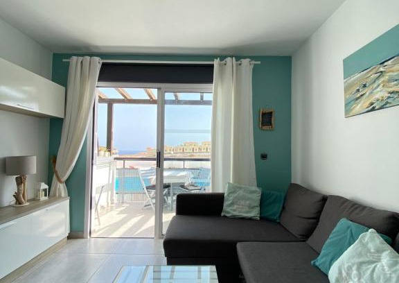 Caleta de Fuste Apartment | Ocean View Retreat: 10/10 Rated Apartment with Pool