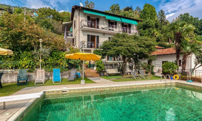 Suna Apartment | Relaxing 2-Bedroom Retreat with Pool and Lake View