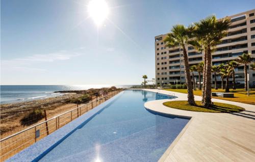 Punta Prima Apartment | Inviting Apartment with Pool in Torrevieja for Families