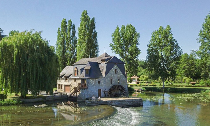 Parce-sur-Sarthe House | Enchanting Water Mill Retreat by the River Near Paris