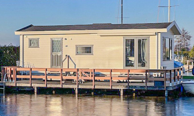 Municipality of Stichtse Vecht House | Relaxing Getaway by the Water with Spa and Lake Views