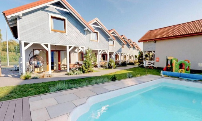 Karwia House | Discover a Fun Family Retreat by the Forest and Beach