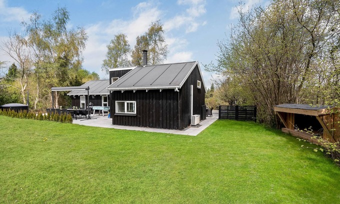 Bøtø By House | Charming 4-Bedroom Retreat in Væggerløse with Ocean Views