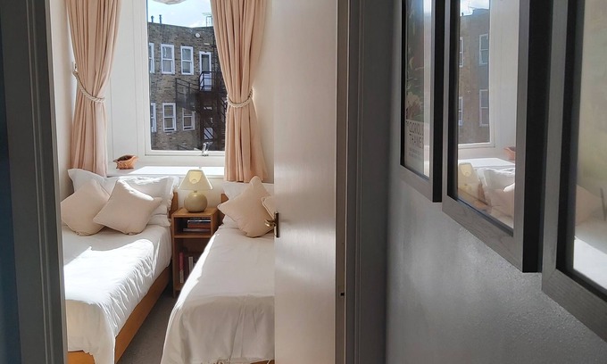 Windsor City Centre Apartment | Prime Location: Explore the City from Our Central Hotel