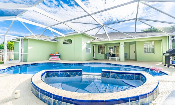 Palm City House | Stylish Home with Heated Pool, Hot Tub & Ocean Views
