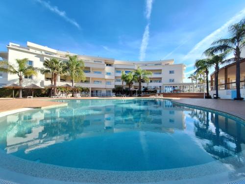 Porto de Mos Apartment | Enchanting Studio with Oceanfront Views and Hot Tub