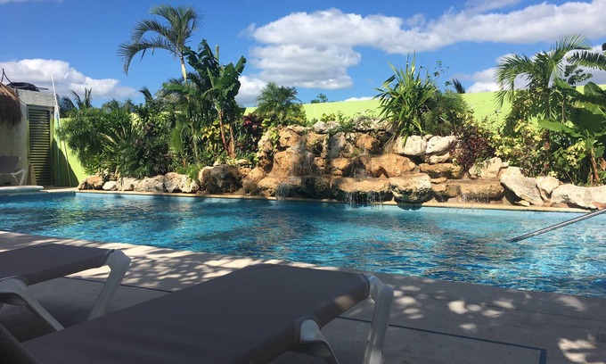 Luis Donaldo Colosio Condo | Beachfront Two Bedroom Condo with Pool & Ocean View