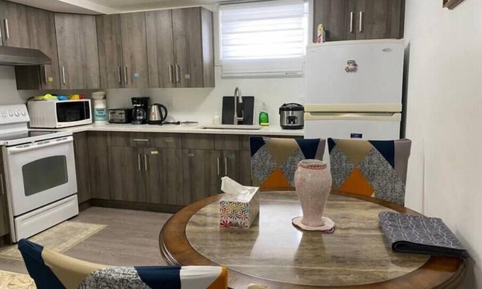 Saskatoon Apartment | Spacious Two-Bedroom Suite with Kitchen & Breakfast Included
