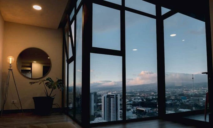 Pavas House | Elevated Getaway: 20th Floor Views Near the Airport