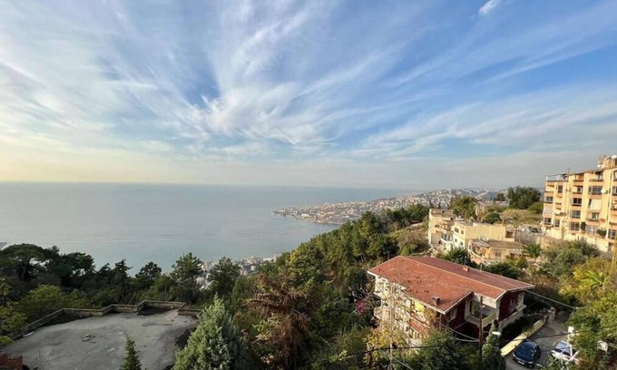 Kfardebian Apartment | Stunning Views and Child-Friendly Comfort in Harissa