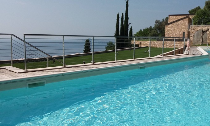 Toscolano Maderno Apartment | Elegant Retreat with Design Pool & Breathtaking Lake Views