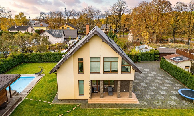 Latgale Suburb Villa | AmberVilla: Relaxing Retreat with Spa and Pool Near City