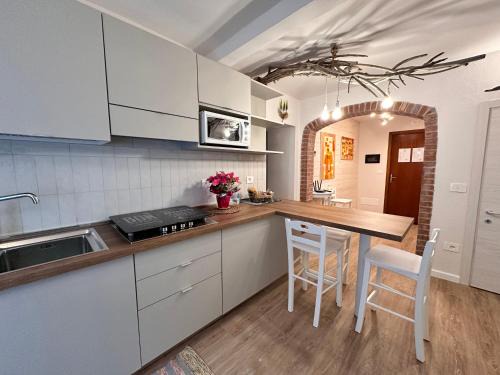 Bagni San Filippo Apartment | Discover Amiter Bagni San Filippo: Family-Friendly Escape