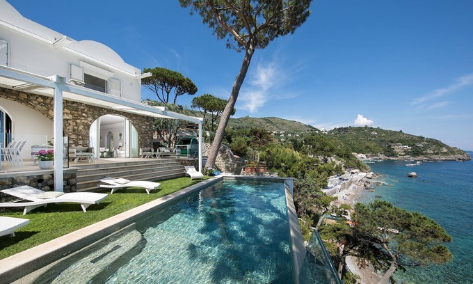 Marina del Cantone Villa | Villa Ibiscus: Infinity Pool & Direct Sea Access Awaits