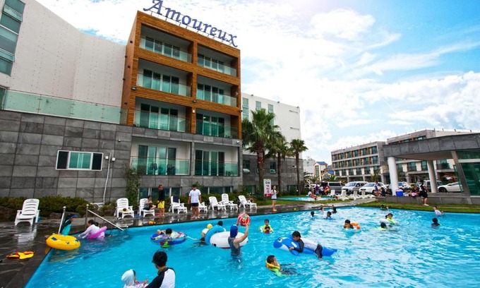Downtown Resort | Oceanfront Amoureux Resort: Poolside Bliss Awaits You