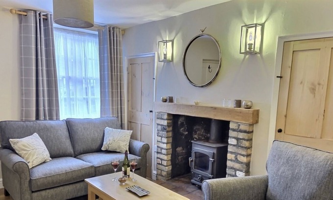 Holt House | Charming Flint Cottage in Holt with Ocean View Amenities