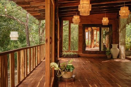 Leona Vicario Cabin | Discover ANAND Ecoaldea: Oceanfront Poolside Paradise