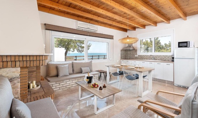 Stegna Apartment | Cozy Anastasio's House Stegna with Oceanfront Hot Tub