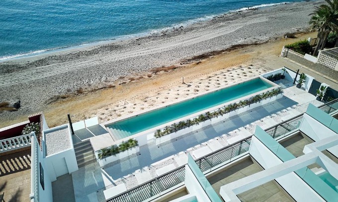 Carboneras Ski Chalet | Experience Comfort at Ancón Suites with Oceanfront Views