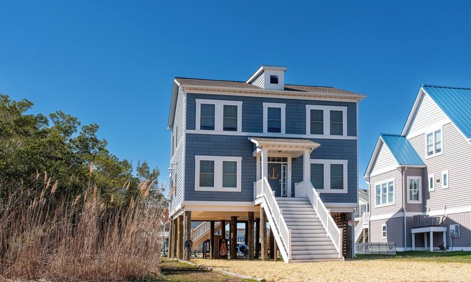 Captain's Cove House | Anchor's Away - Waterfront Retreat with Pools & Pet Access