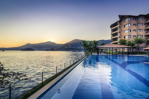 Praia do Jardim Apartment | Relaxing Oceanfront Stay at Porto Bali, Angra dos Reis