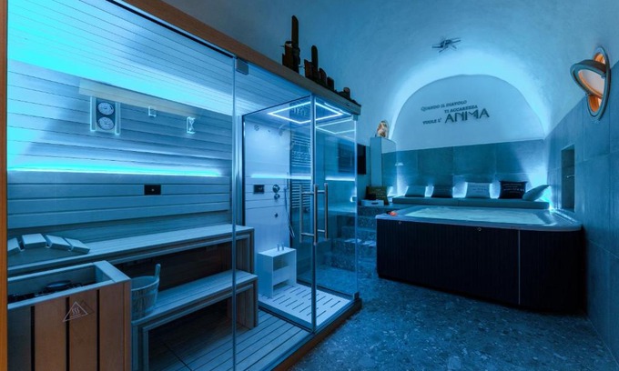 Procida Apartment | Indulge at Anima Suite: Sauna, Jacuzzi & Restaurant Bliss