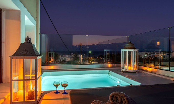 Monolithos Villa | Anna's Villa: Private Jacuzzi with Spectacular Sea View