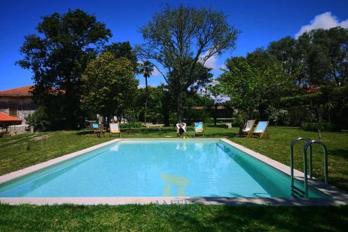 Belinho House | Oceanfront Antas Guest House with Pool and Family Amenities
