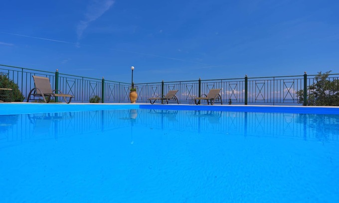 Koutsi Apartment | Relax at Antigoni Villa Ena: Pool, Ocean Views & A/C