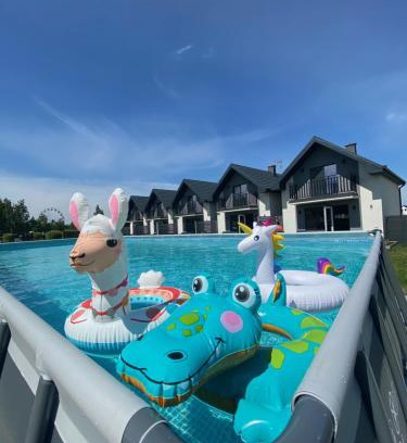 Leba House | Discover Antracytowy Zakątek: Family-Friendly Oceanfront Retreat