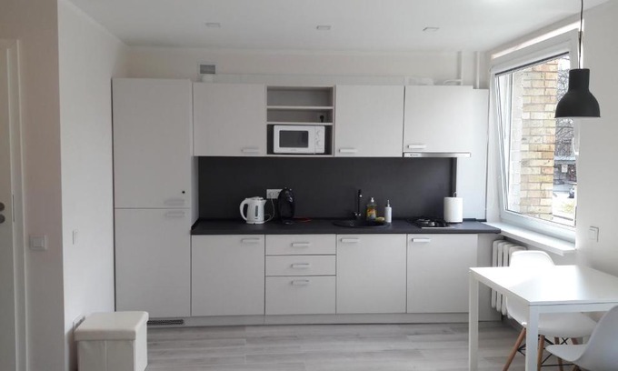 Anyksciai Apartment | Top-Rated Anykščiai Center Apartment for Family Stays