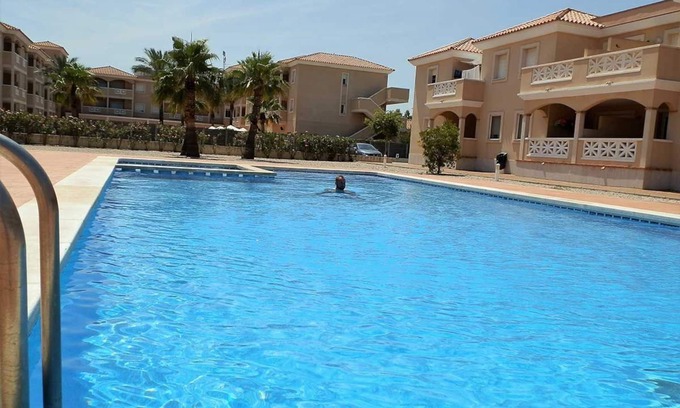 Riumar Apartment | AP DUNES ROS: Perfect Getaway with Pool & Pet-Friendly Options