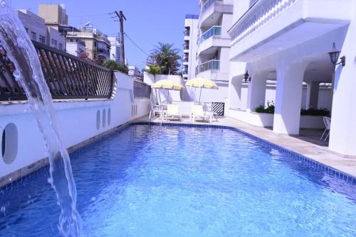 Jardim Praiano Apartment | Top-Rated Ap Enseada: Pool, Ocean View & Free Wi-Fi