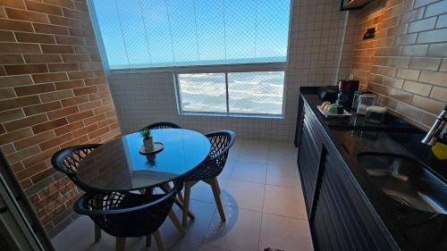 Vila Anhanguera Apartment | Oceanfront Escape with Air Conditioning and Gourmet Balcony