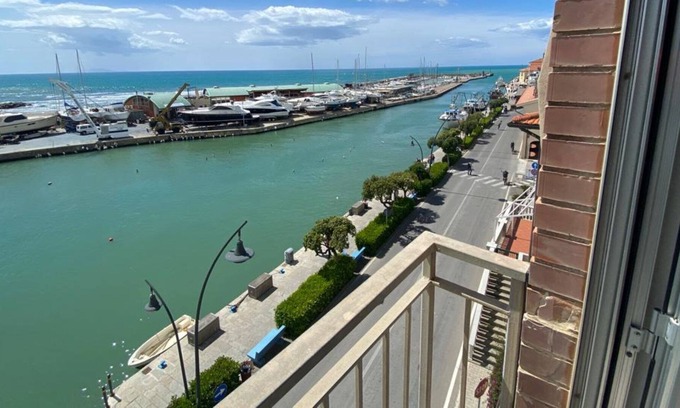 Castiglione della Pescaia Apartment | Canal View Apartment - Family-Friendly with Kitchen Access