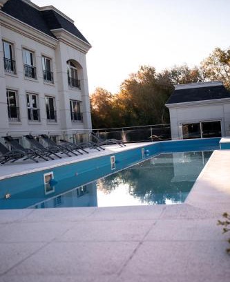 Rio Cuarto Apartment | Family-Friendly Apart France: Pool, Hot Tub & Parking