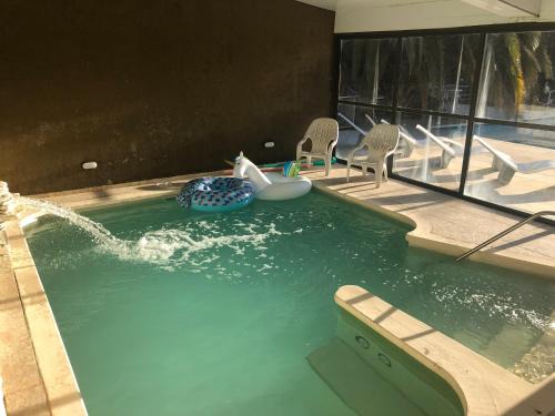 Villa Carlos Paz Apartment | Comfort at Apart-Hotel Gibert's House with Pool & Hot Tub