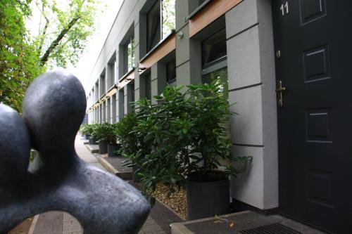 Praga Polnoc Apartment | Stylish Apart Lofts Car Factory with Family-Friendly Amenities