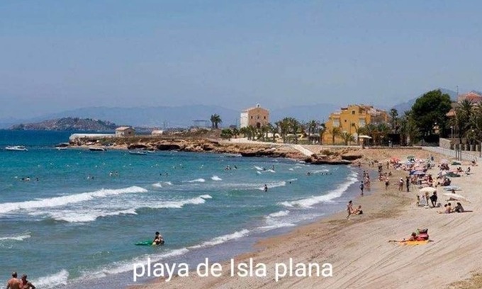 Los Puertos Apartment | Tranquil Seaside Retreat with Large Terraces and Family-Friendly Amenities