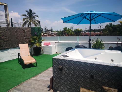 Lourdes Apartment | Pet-Friendly Aparta-Hotel CASA REAL with Ocean View & Hot Tub