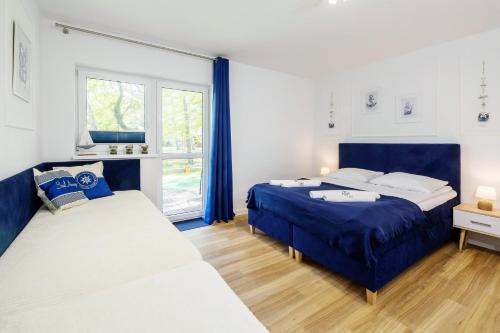 Poddabie Apartment | Experience Blue Marine Poddąbie: Pool, Oceanfront & Kids' Fun