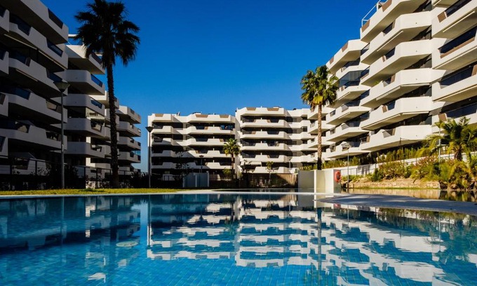 Els Arenals del Sol Apartment | Oceanfront Haven: Arenales Playa with Pool & Hot Tub