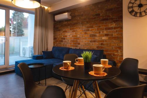 Trygort Apartment | Inviting Loft Apartment in Mazury with Hot Tub Access