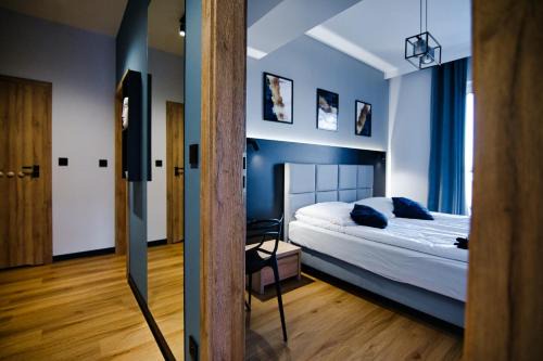 Zator Apartment | Discover Apartament No 61: Pet-Friendly Blue Holiday Home